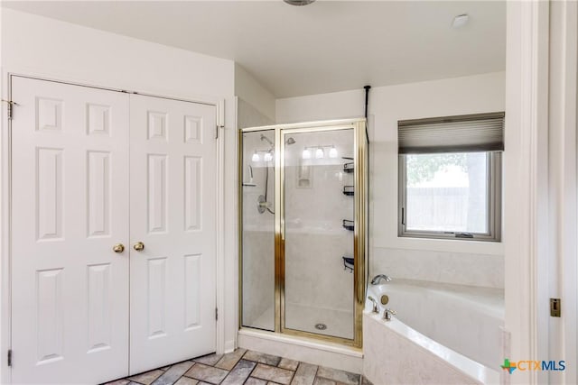 1812 Bowen Ave, Copperas Cove, TX 76522 - bathroom featuring a stall shower and a garden tub