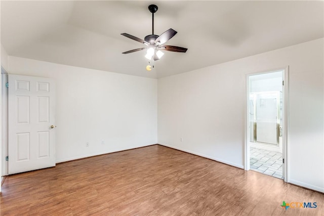 1812 Bowen Ave, Copperas Cove, TX 76522 - empty room with ceiling fan, wood finished floors, and baseboards