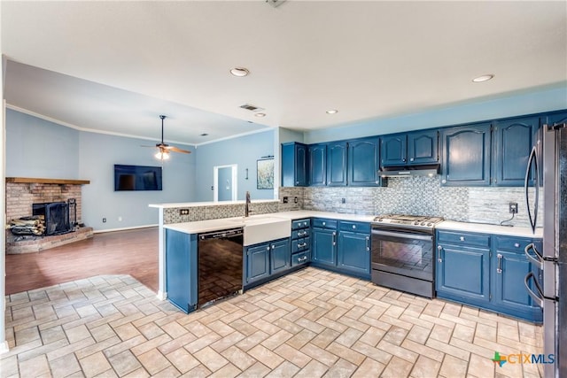1812 Bowen Ave, Copperas Cove, TX 76522 - kitchen featuring stainless steel appliances, a sink, under cabinet range hood, light countertops, and decorative backsplash