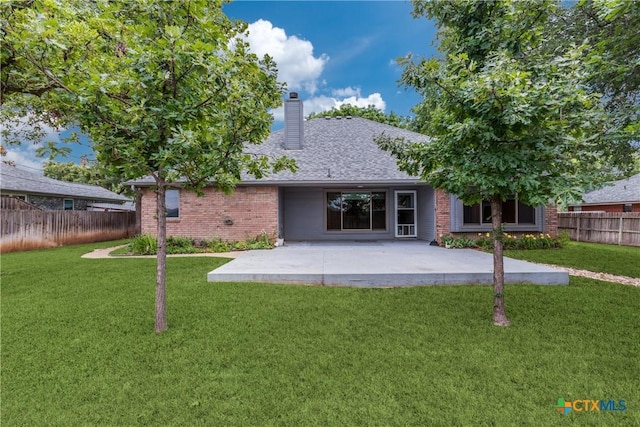 1812 Bowen Ave, Copperas Cove, TX 76522 - back of house with brick siding, a chimney, a patio area, and a shingled roof