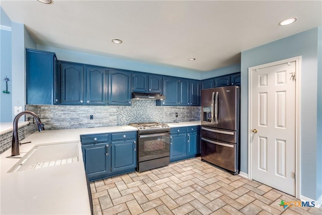 1812 Bowen Ave, Copperas Cove, TX 76522 - kitchen with stainless steel fridge with ice dispenser, range with gas stovetop, a sink, blue cabinetry, and brick patterned flooring