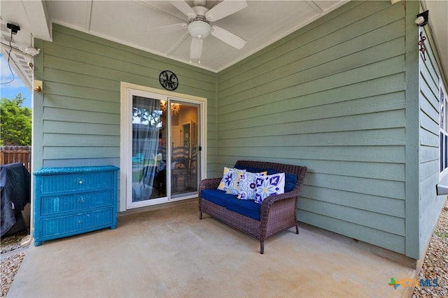 view of patio featuring ceiling fan