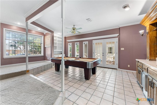 906 Illinois Ave, Killeen, TX 76541 - playroom with french doors, ornamental molding, healthy amount of natural light, light tile patterned flooring, and baseboards