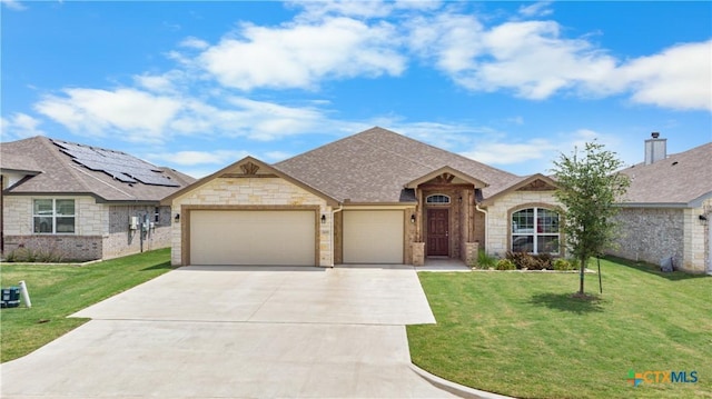 2655 Belle Hubbard Trl, Belton, TX 76513 - french country inspired facade featuring a garage, concrete driveway, stone siding, and a front lawn
