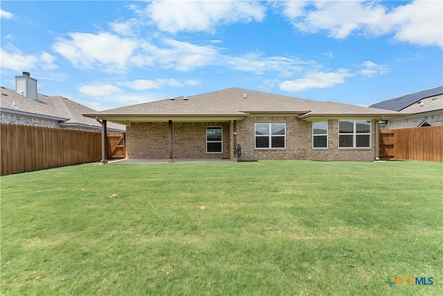 2655 Belle Hubbard Trl, Belton, TX 76513 - back of house featuring a patio area, a fenced backyard, and brick siding