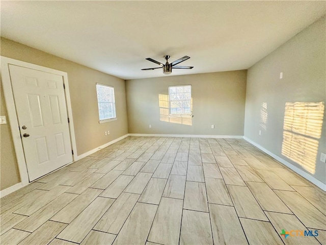 spare room with ceiling fan