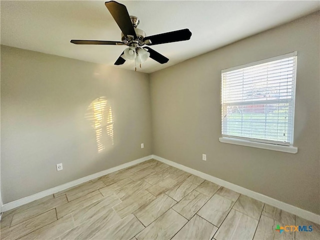 unfurnished room with ceiling fan