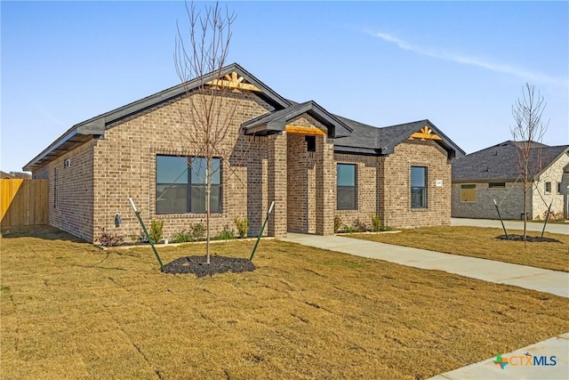 view of front of home with a front yard