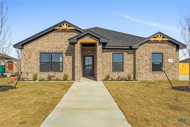 view of front of home with a front yard