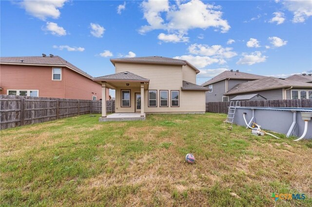 4703 Prewitt Ranch Rd, Killeen, TX 76549 - rear view of house with a patio