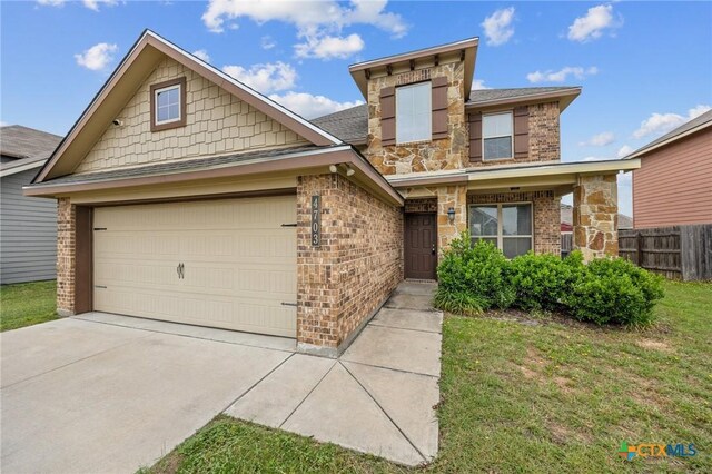 4703 Prewitt Ranch Rd, Killeen, TX 76549 - view of front of house featuring brick siding, driveway, and an attached garage