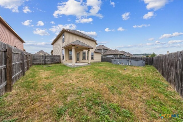 4703 Prewitt Ranch Rd, Killeen, TX 76549 - back of house featuring a patio