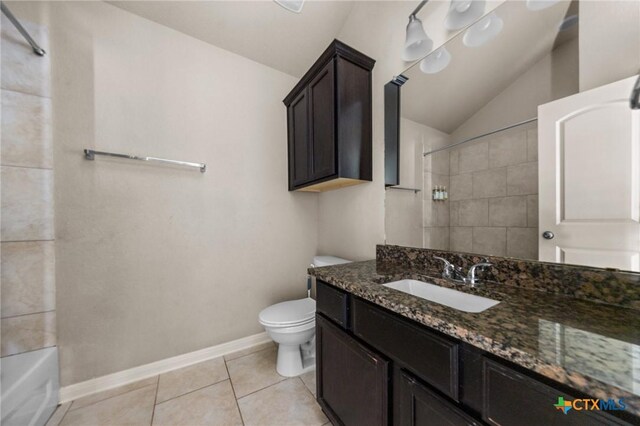 4703 Prewitt Ranch Rd, Killeen, TX 76549 - full bath featuring vaulted ceiling, toilet, vanity, tile patterned flooring, and baseboards