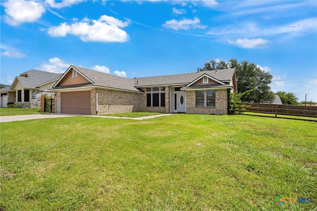 4818 Bramblewood Dr, Killeen, TX 76542 - view of front of house with brick siding, a garage, and concrete driveway