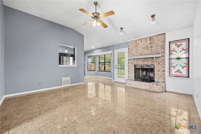 4818 Bramblewood Dr, Killeen, TX 76542 - unfurnished living room with vaulted ceiling, a ceiling fan, and a fireplace