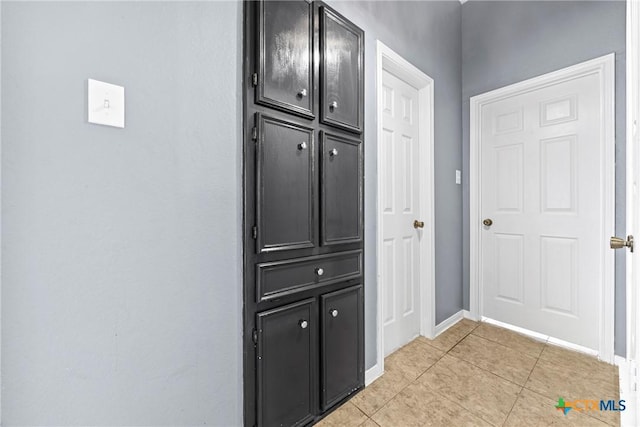 4818 Bramblewood Dr, Killeen, TX 76542 - doorway featuring light tile patterned floors and baseboards