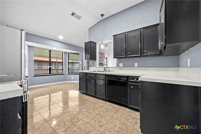 4818 Bramblewood Dr, Killeen, TX 76542 - kitchen featuring dishwasher, dark cabinetry, light countertops, and a textured ceiling