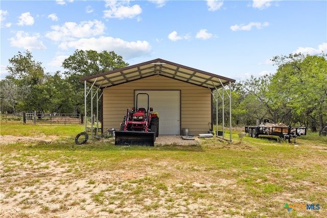 view of outbuilding with a carport