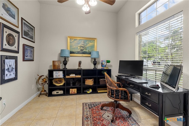 office featuring ceiling fan and light tile patterned floors