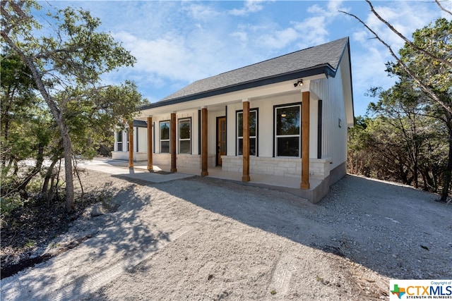 view of front of home featuring covered porch