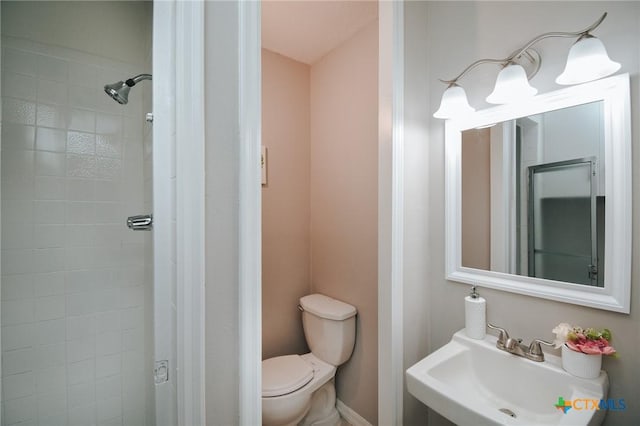 bathroom featuring toilet and a sink