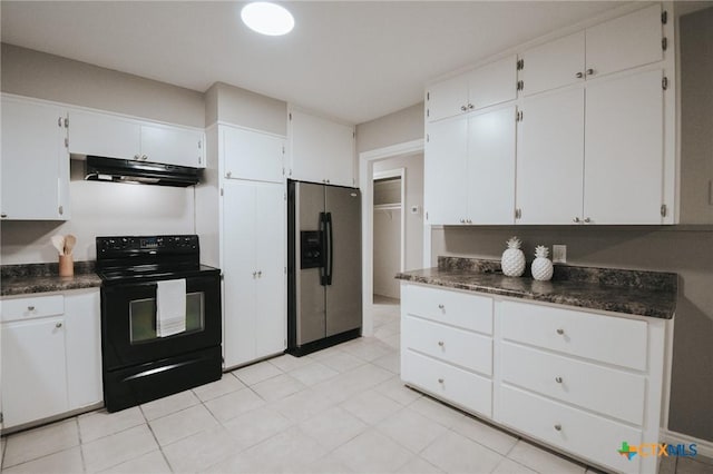 kitchen with under cabinet range hood, electric range, dark countertops, and stainless steel fridge with ice dispenser