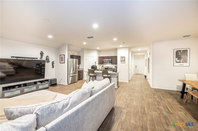 living room featuring light wood-type flooring