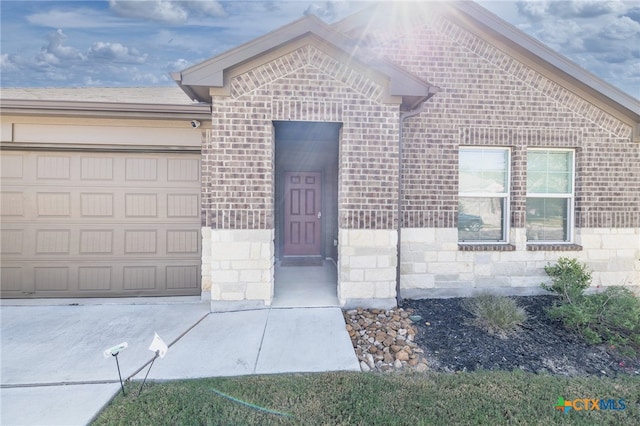 property entrance with a garage