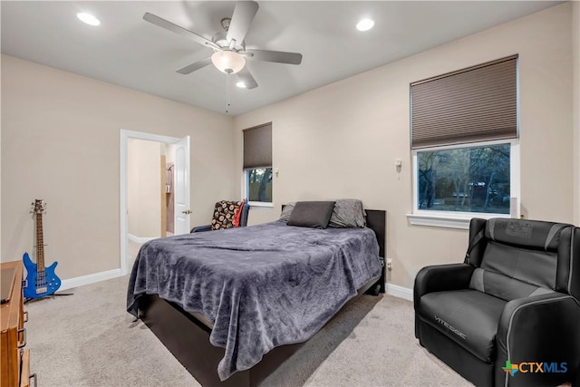 carpeted bedroom with ceiling fan