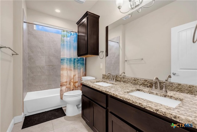 full bathroom featuring vanity, tile patterned floors, toilet, and shower / bath combo