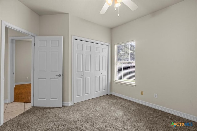 402 Prospector Trl, Harker Heights, TX 76548 - unfurnished bedroom with light colored carpet, a closet, a ceiling fan, and light tile patterned floors