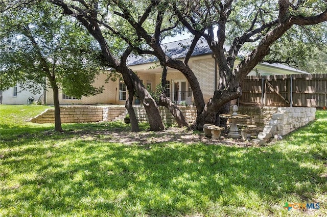 402 Prospector Trl, Harker Heights, TX 76548 - rear view of property featuring brick siding and french doors