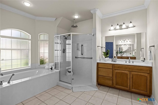 402 Prospector Trl, Harker Heights, TX 76548 - full bathroom featuring a stall shower, crown molding, a bath, vanity, and tile patterned flooring