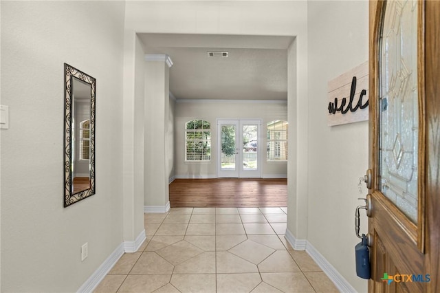 402 Prospector Trl, Harker Heights, TX 76548 - corridor with ornamental molding and light tile patterned floors