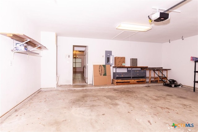 212 Oak Ridge Dr, Nolanville, TX 76559 - garage featuring electric panel and a garage door opener