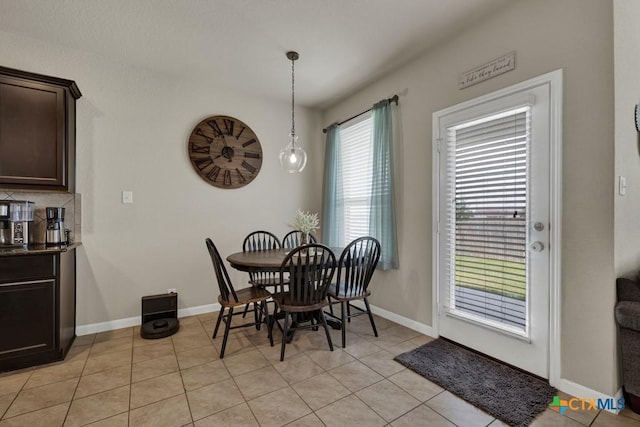 1398 Fall Cover St, New Braunfels, TX 78130 - dining space with baseboards and light tile patterned floors