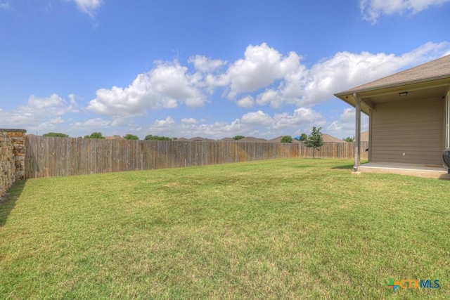 1398 Fall Cover St, New Braunfels, TX 78130 - fenced backyard with a patio area