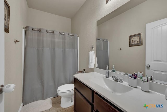 1398 Fall Cover St, New Braunfels, TX 78130 - full bathroom featuring vanity, tile patterned floors, and a shower with curtain