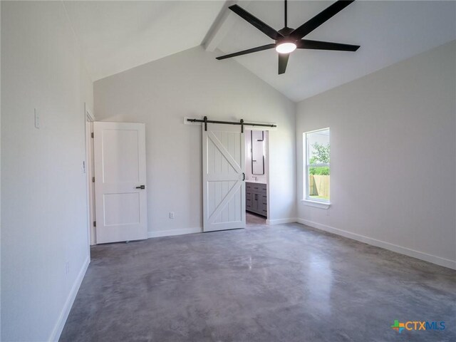 307 Cedarhill Dr, Granite Shoals, TX 78654 - unfurnished bedroom with beamed ceiling, baseboards, high vaulted ceiling, and a barn door
