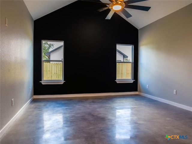 unfurnished room featuring lofted ceiling and ceiling fan