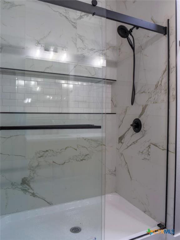 bathroom with walk in shower