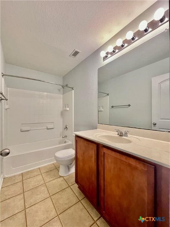 110 Rush Hvn, San Marcos, TX 78666 - bathroom featuring shower / tub combination, toilet, a textured ceiling, visible vents, and tile patterned floors