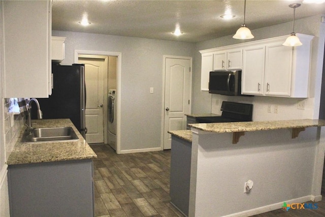 kitchen featuring sink, dark wood-type flooring, black electric range, a breakfast bar area, and white cabinets