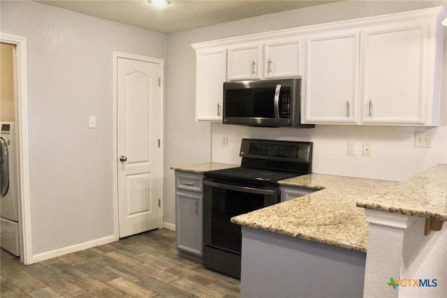 kitchen featuring light stone countertops, dark hardwood / wood-style flooring, backsplash, white cabinets, and black electric range oven