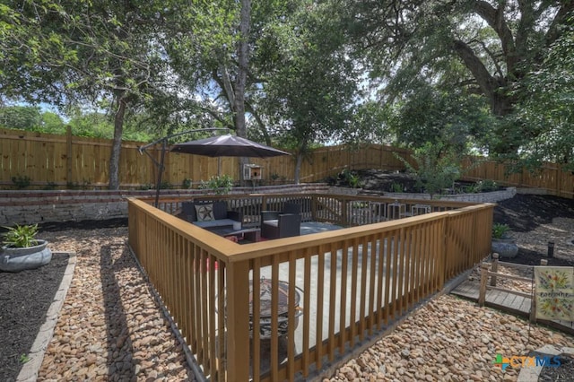 332 W Klein St, Seguin, TX 78155 - deck with outdoor lounge area and a fenced backyard