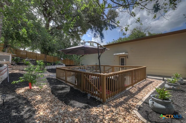 332 W Klein St, Seguin, TX 78155 - wooden deck featuring a fenced backyard