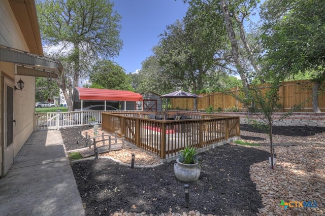 332 W Klein St, Seguin, TX 78155 - fenced backyard featuring a deck