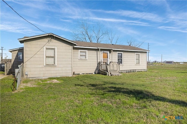 view of front of property with a front lawn