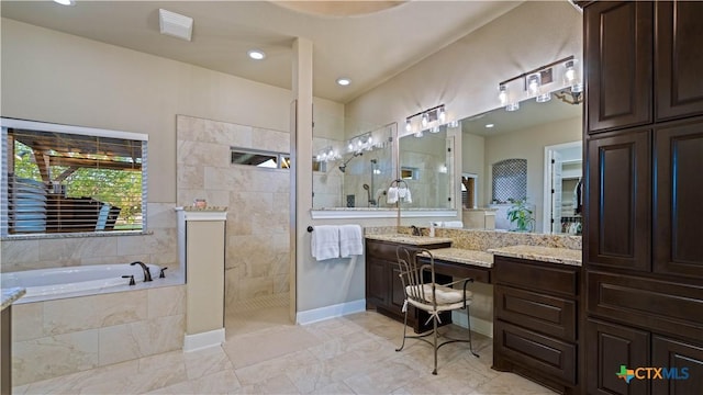 bathroom featuring a walk in shower, visible vents, a garden tub, and vanity