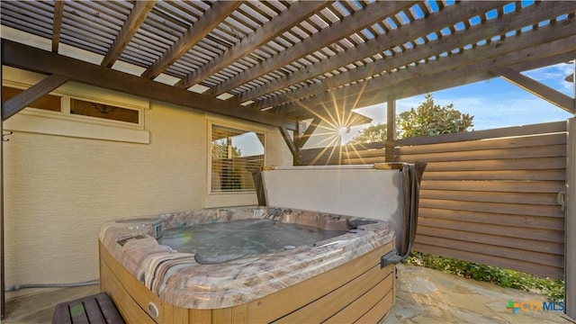 deck with a hot tub